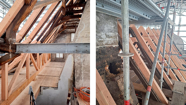 Dachstuhl mit neuen Holzbalken und Metallstützen in einem historischen Gebäude unter Renovierung